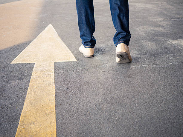 istock Concept of a man follows the right way 604383740