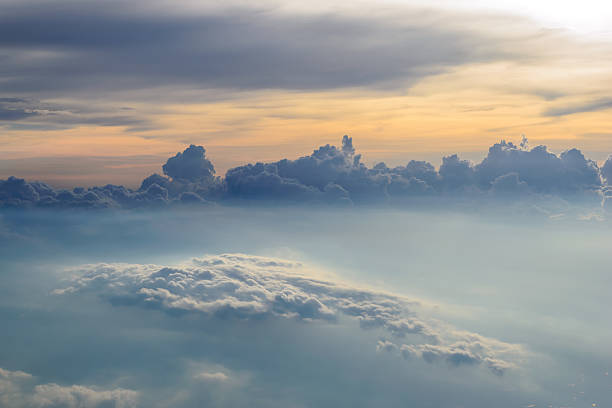 istock Sky and Sunset View above the Clouds from airplane 604752228