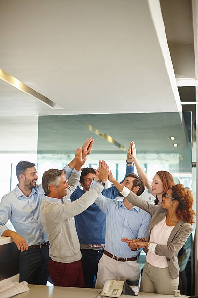 istock Confidence and positivity - wining attributes of a successful team 604792892