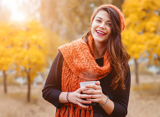 istock Young girl with a cup of coffee 604821314