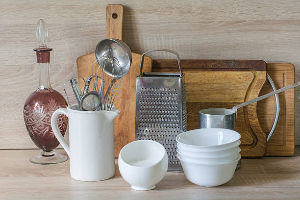 istock Crockery, tableware, utensils and other different stuff on wooden table-top. 604823424