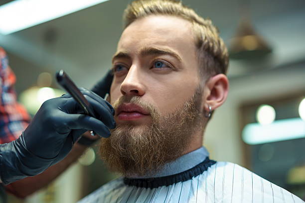 istock Hipster in barber shop 604825208
