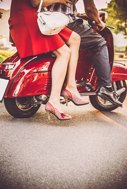 istock Young Couple on a Vintage Scooter 604828510