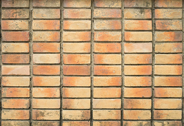 istock the old and dirty orange brick wall 604828746