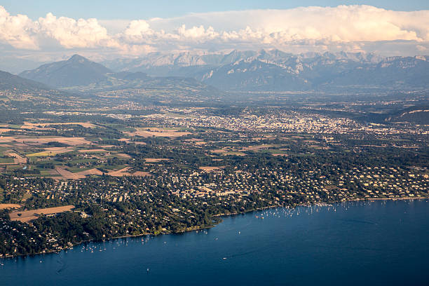 istock Aerial view over Alps mountain range and Geneva area, Switzerland 604829352
