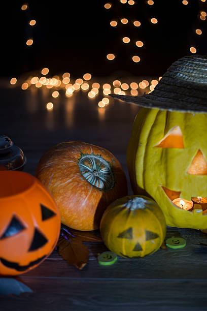 istock Halloween pumpkin head jack lantern on wooden background 604831844