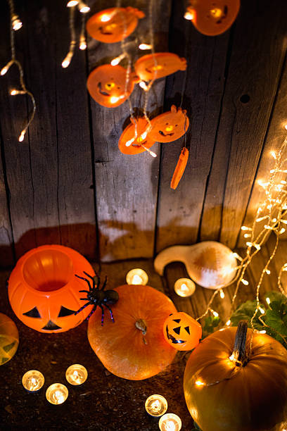 istock Halloween pumpkin head jack lantern on wooden background 604832234
