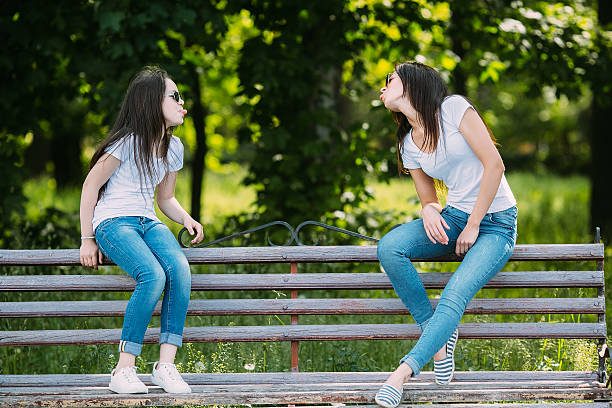 istock mother and daughter in the park 604855670