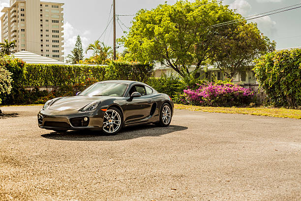 Full shot Porsche Cayman in residential area stock photo