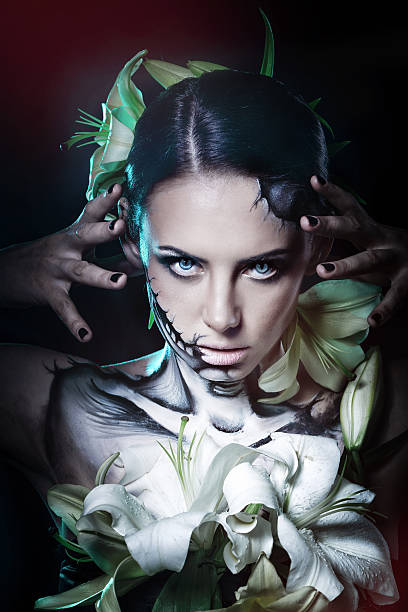 istock Girl with makeup for Halloween. Terrible 604860052