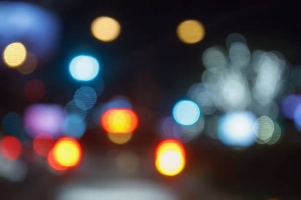 istock City Traffic Lights Background With Blurred Lights 604860550