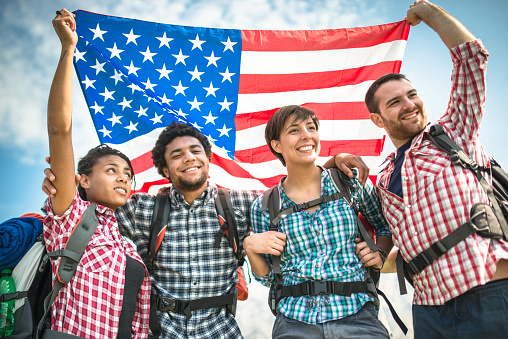 backpacker togetherness with american flag
