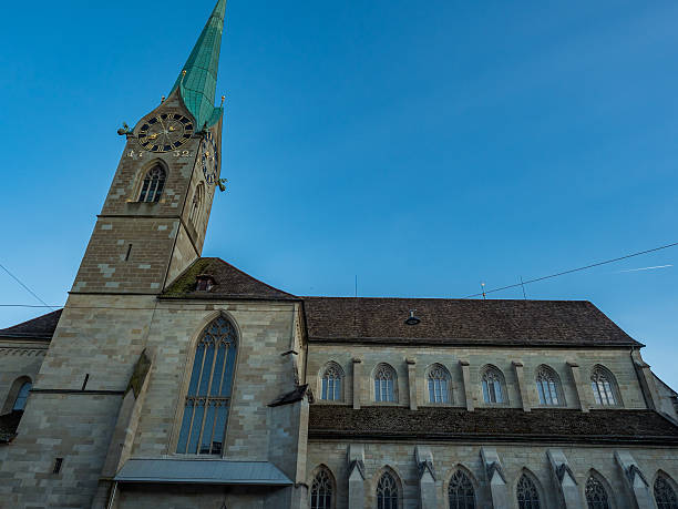 istock Church with a tower in downtown Zurich 604863036
