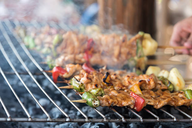 istock Grilling shashlik on barbecue grill 604867984