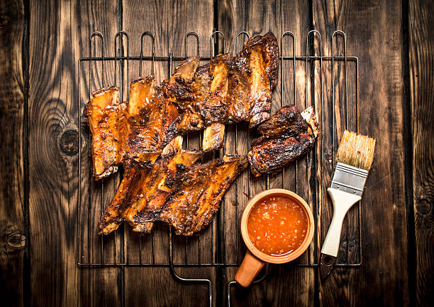 istock Fried pork ribs with tomato sauce. 604876428