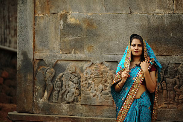 istock Hindu Woman in Temple 604892522