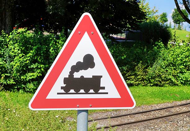 istock Attention Sign Train Crossing Road 604895470