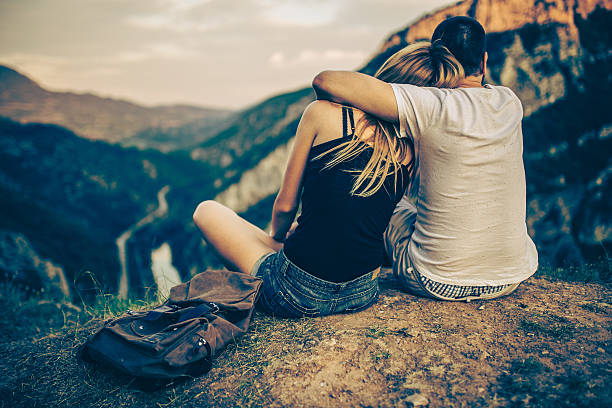 istock Couple enjoying on the mountain 604898782