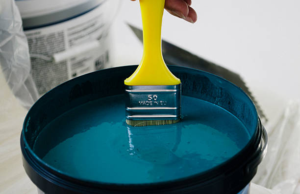 istock paint brush in a bog paint-box 604902778
