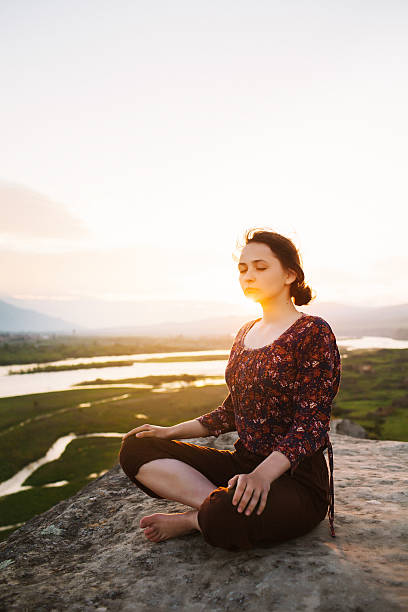 istock Young girl doing yoga 604903920
