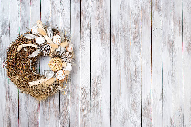 istock Christmas wreath on wooden background. Space for text. 605737026