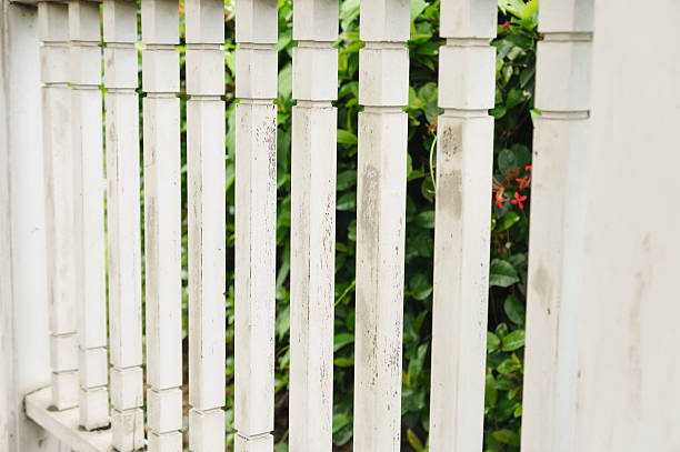 istock White picket fence in  pavilion. 605737598