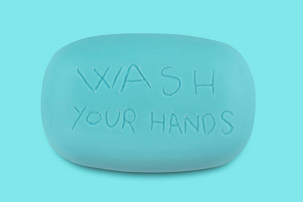 istock blue soap bar with wash your hands written 605737778