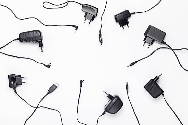 Power charger different adapters Power charger different adapters circle background, empty space phone charger cable stock pictures, royalty-free photos & images