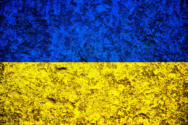 istock Ukraine flag on stone background 605742066