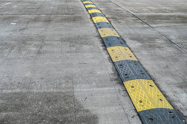 istock Yellow and black speed bump 605743630