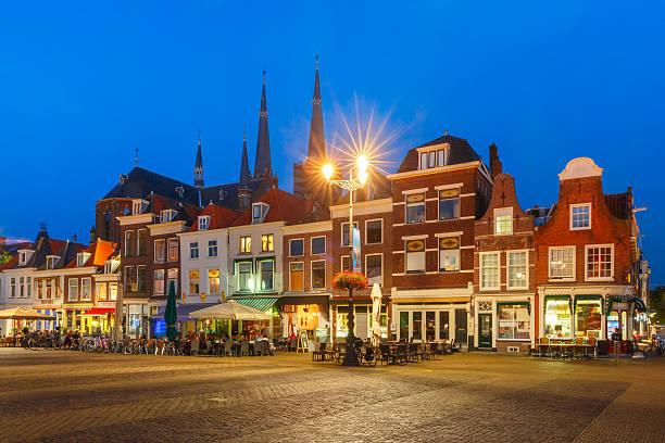 istock Markt square at night in Delft, Netherlands 605743922