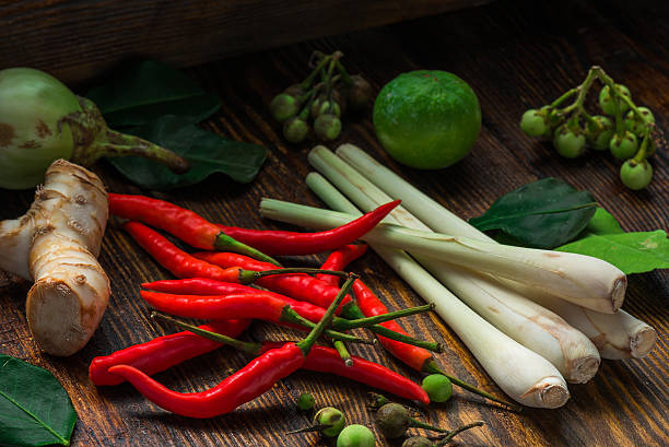 istock Tom yam ingredients set for Thai cuisine on wooden table 605744676