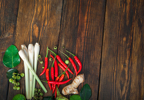 istock Thai cuisine ingredients set on wooden table 605744808