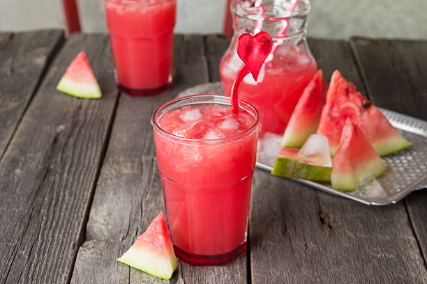istock Watermelon smoothie on a dark wooden background 605746512