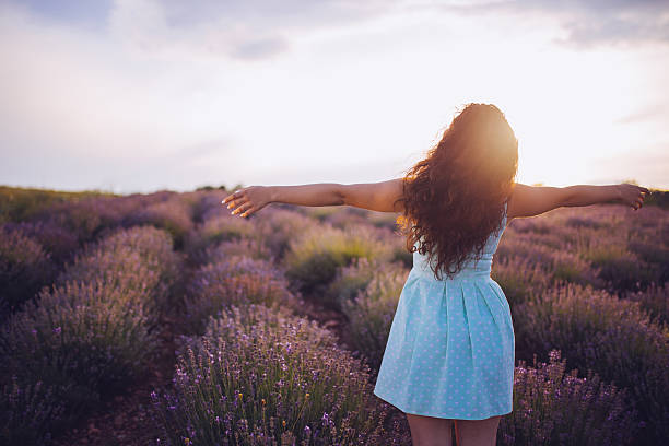 istock Arms out in lavender field 605746814