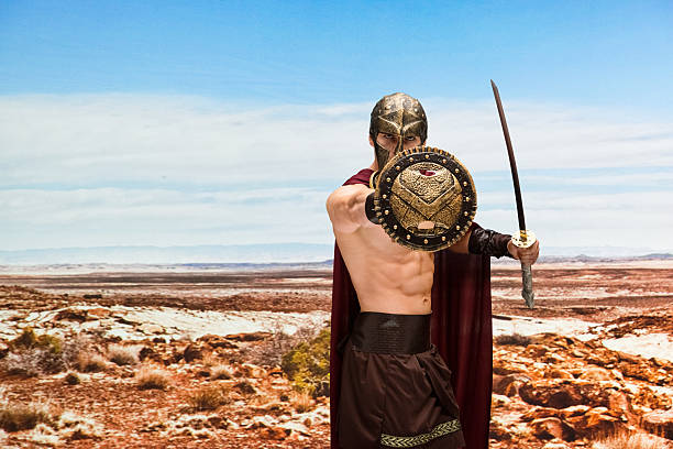 gladiadores luchando en el desierto - 20s standing one man only sword fotografías e imágenes de stock