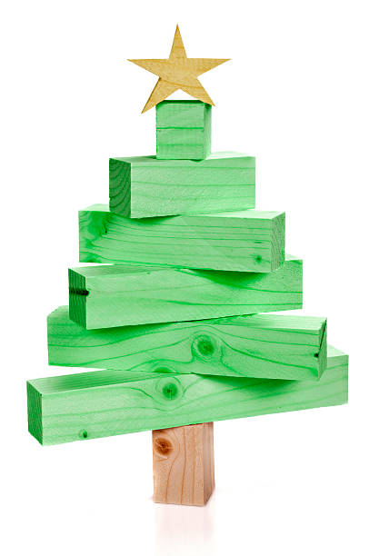 istock Stacked lumbers in the shape of a christmas tree 605755316