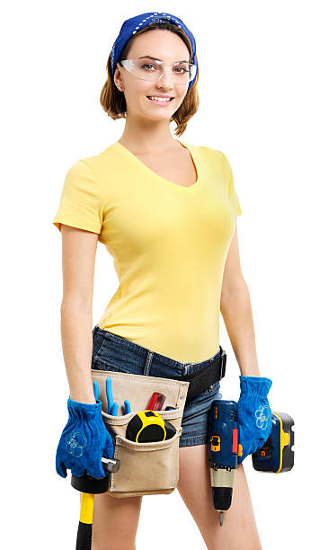 istock Young Woman Contractor Construction Carpenter on White 605755624