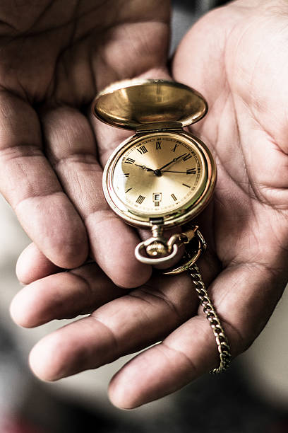 uomo anziano con orologio da tasca - clock time clock hand urgency foto e immagini stock