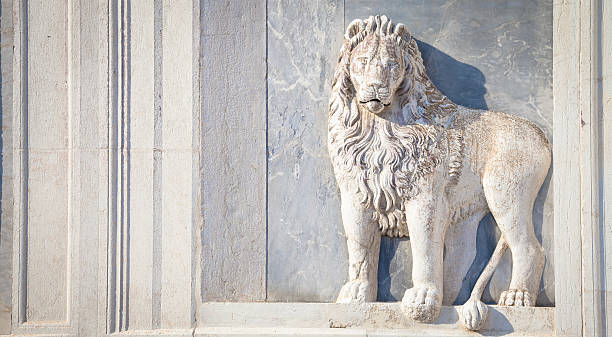 istock Marble lion on church facade 605756512