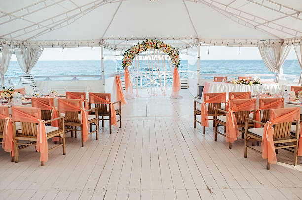 istock Wedding ceremony decoration at the sea 605757316