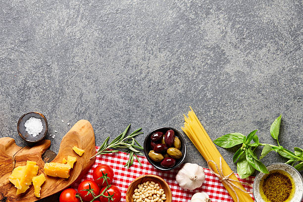 istock Italian food ingredients on stone background 605758954