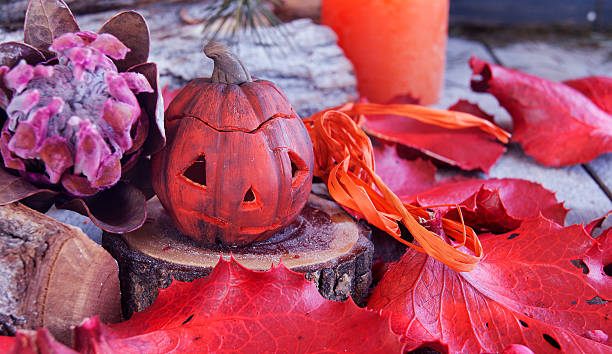 istock decorative pumpkin for Halloween with dried flowers 605764554