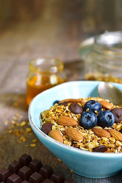 istock Granola with chocolate and almond - healthy breakfast concept. 605766584
