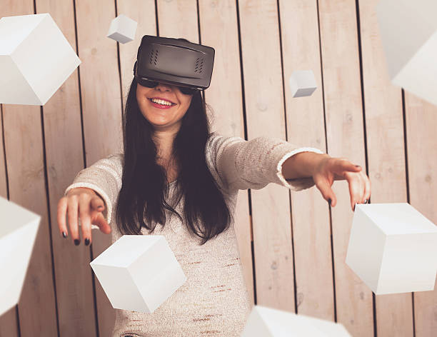 istock Woman in VR glasses 605769122
