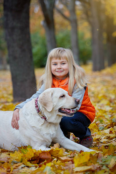 istock Girl and her dog 605769838