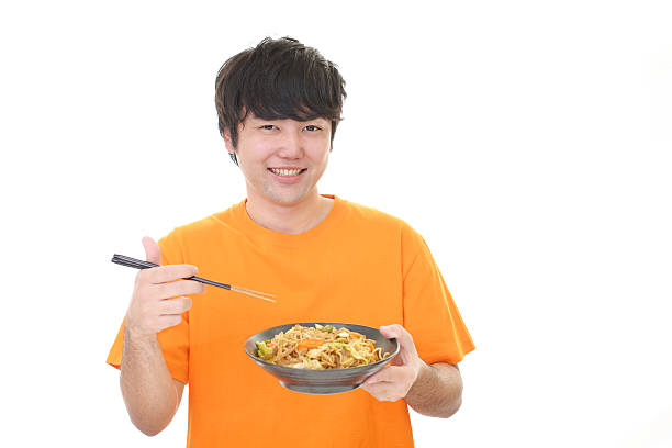 istock The man who eats food 605770002