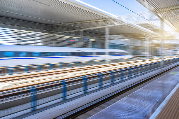 istock high-speed rail arriving at station 605770564