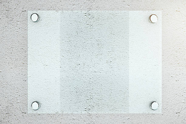 istock Glass plate on textured concrete 605770576