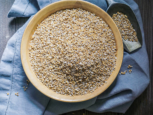 istock Raw Organic Steel Cut Oats in a Bowl. 605771670